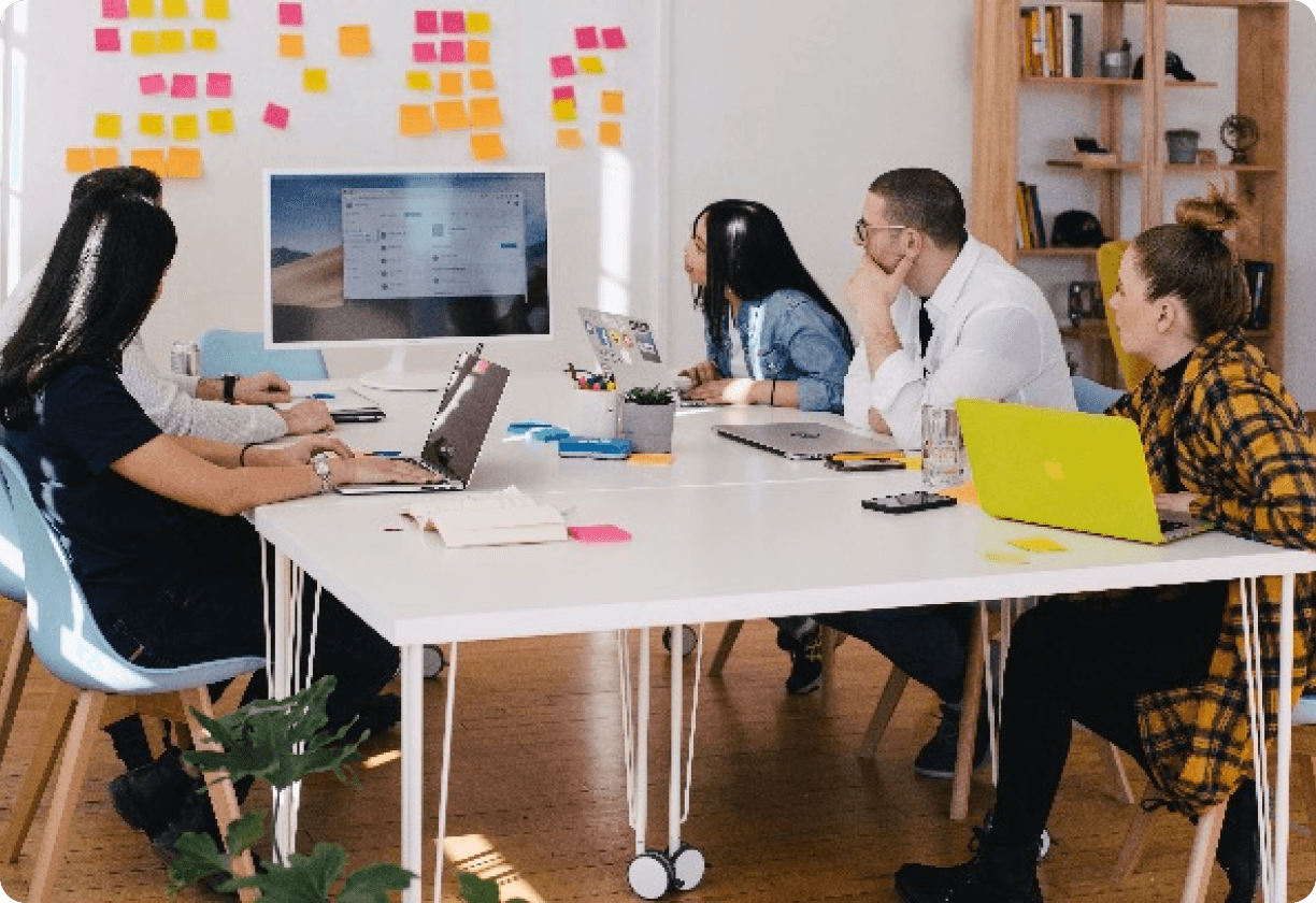 A group of people in a meeting.