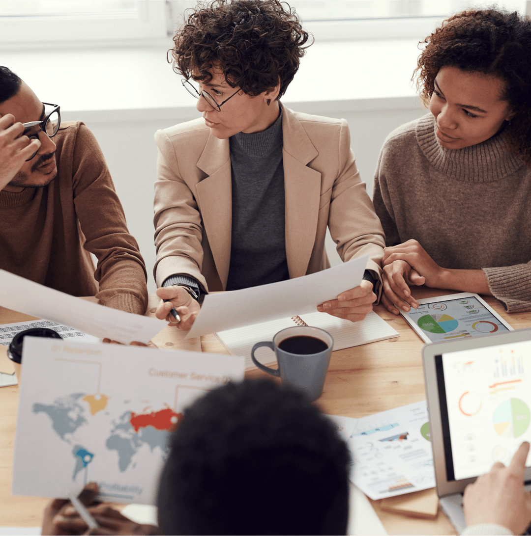 A group of people in a meeting